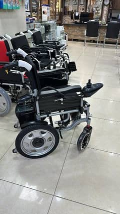Electric Wheelchair Joystick Controlled wheel chair with dry Battery