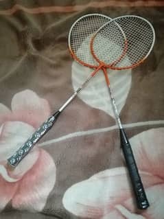 10/10 racket pair but used one day.