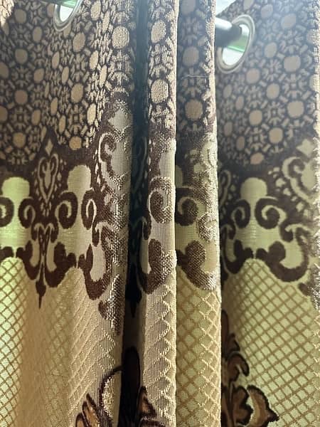Curtains Brown color/ two piece. Good Condition . Almost new 2