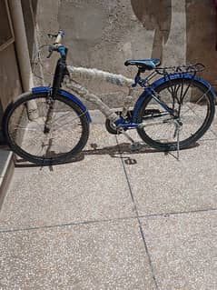 26 inch Blue bicycle with dual brakes