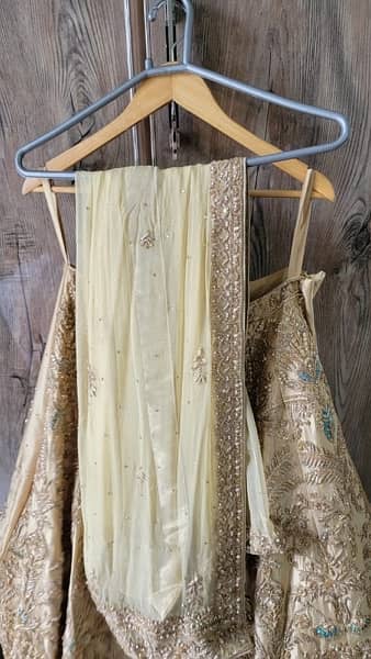 Bridal dress lehnga golden Hoorain collection Liberty 2