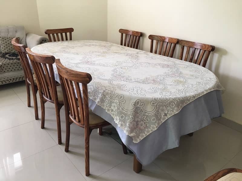 wooden dinning table with 8 chairs 0
