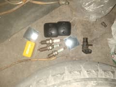 CNG kit and cylinder itly. tyre with rim. fan. spark plugs. jack
