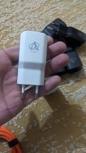 Best quality lot and original mobile chargers /adopters 7
