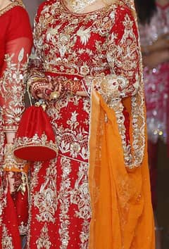 Red and goldn colors bridal lahnga very low price itny mn koi ni dy ga