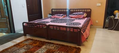 Antique solid wood two bed set excellent condition