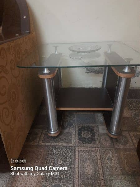 1 centre table and 2 side tables with glass top 1