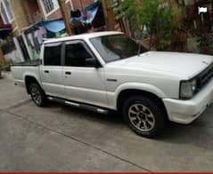 Mazda B2200 1992, petrol 2000cc lpg avrge 17,18