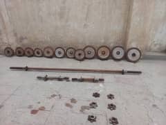 old gym rod, dumble, plates and table for home excersise