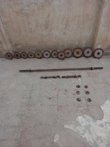 old gym rod, dumble, plates and table for home excersise 11