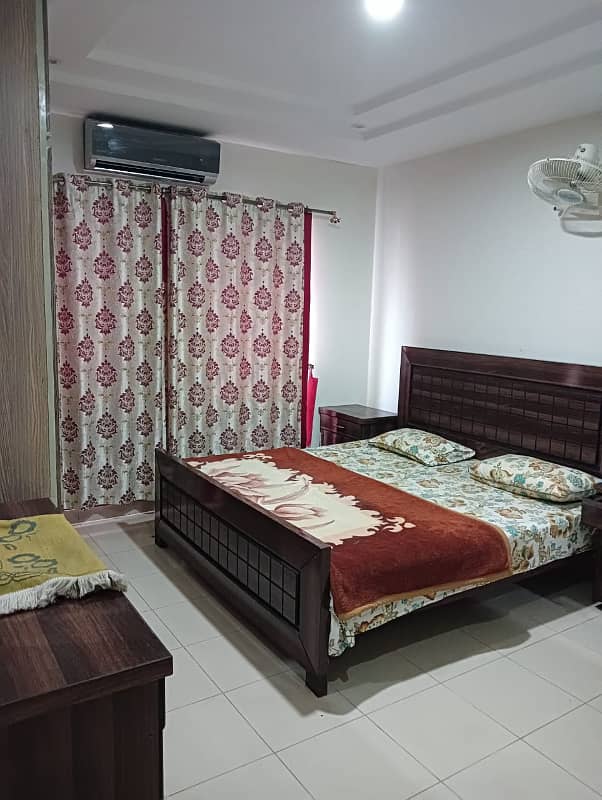 Fully furnished 2 bed flat for rent in empire hights phase 6 bahira Town 0