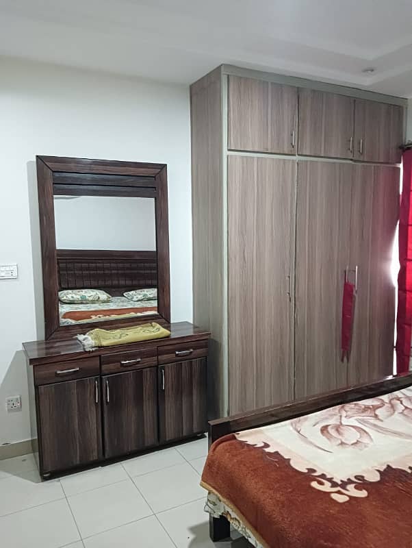 Fully furnished 2 bed flat for rent in empire hights phase 6 bahira Town 3