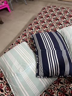 3 x IKEA pillows with pillow cases are available for sale