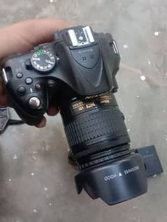 Nikon D5200 Camera, Tripod, 2 battery, Charger, Hood, Bag