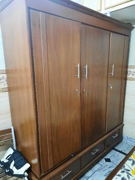 King size bed with dressing, side table and large size wardrobe 6