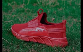 New red sneakers available at a reasonable price.