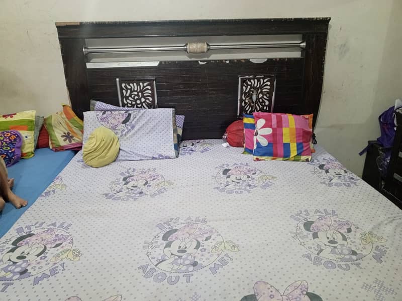 King size bed without mattress, 2 side tables, 3 door almaari 6