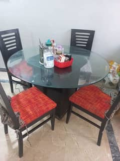 four seater dinning table wood n glass top