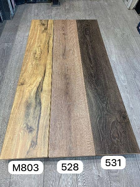 HDF Laminate Wooden Floors/ wallpaper/ pvc skirting. 1