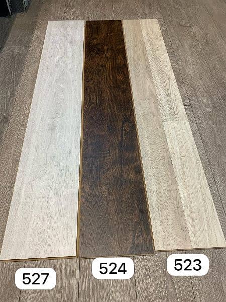 HDF Laminate Wooden Floors/ wallpaper/ pvc skirting. 2