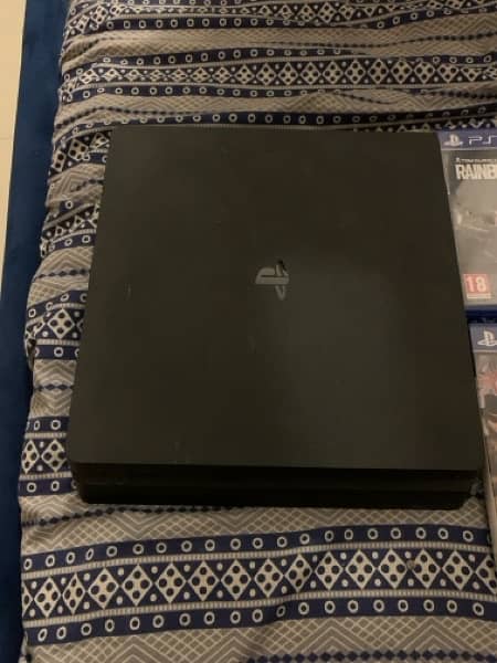 ps4 slim edition 500 gb with controller and 5 games 2