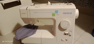 A unique style Japanese brand sewing machine.