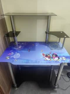 Glass computer table for sale.