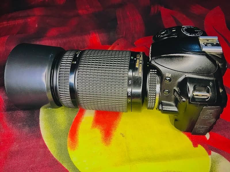Nikon D3100 with  70-300mm manual Lens with other accessories 5