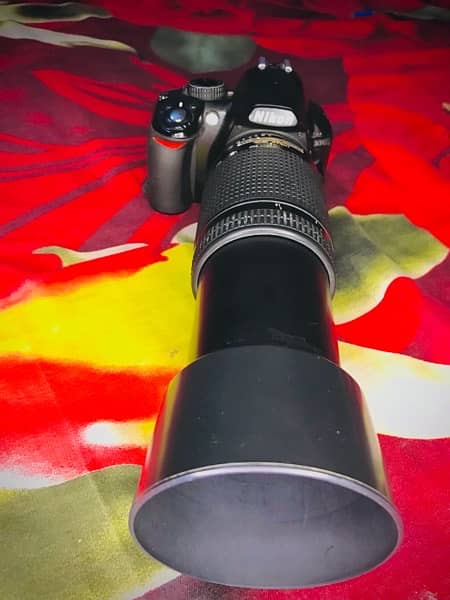 Nikon D3100 with  70-300mm manual Lens with other accessories 7