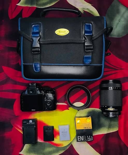 Nikon D3100 with  70-300mm manual Lens with other accessories 13