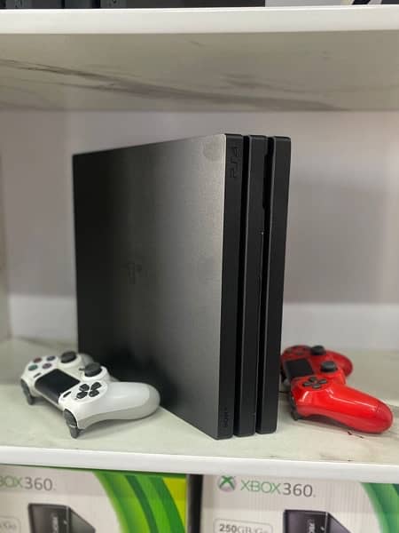 PS4 PRO 1TB With 3 Controllers & Multiple CD’s 0
