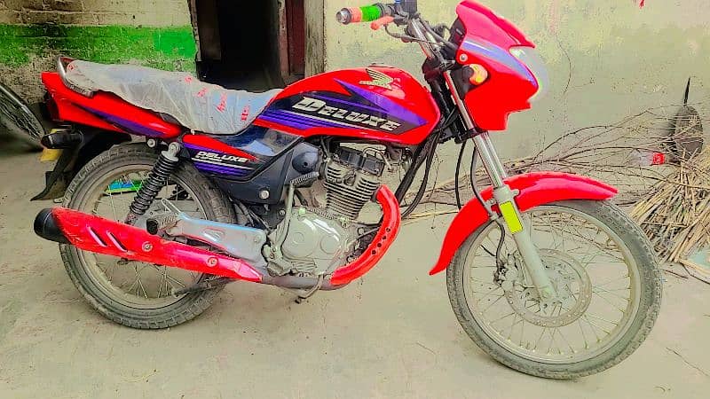 honda delux 125 total orignal engin be awaz 10by10 sat condition 0