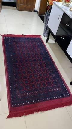 maroon and blue rug