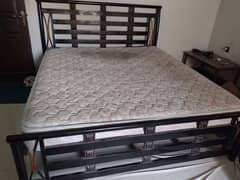 Iron king size bed with the mattress for sale