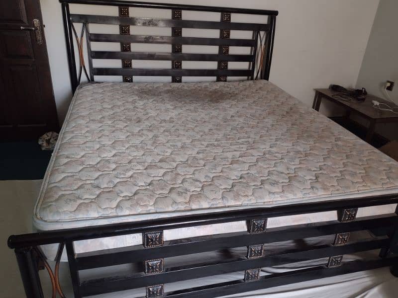 Iron king size bed with the mattress for sale 1