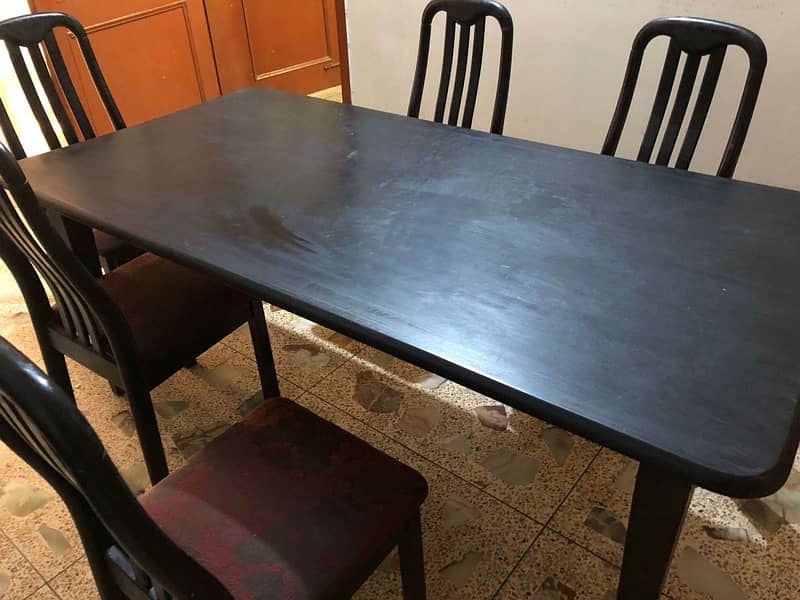 Wooden dining table with 6 chairs. 1