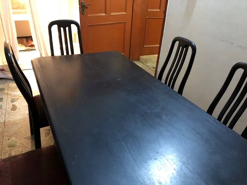 Wooden dining table with 6 chairs. 2