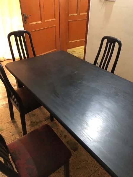 Wooden dining table with 6 chairs. 4