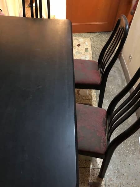 Wooden dining table with 6 chairs. 7
