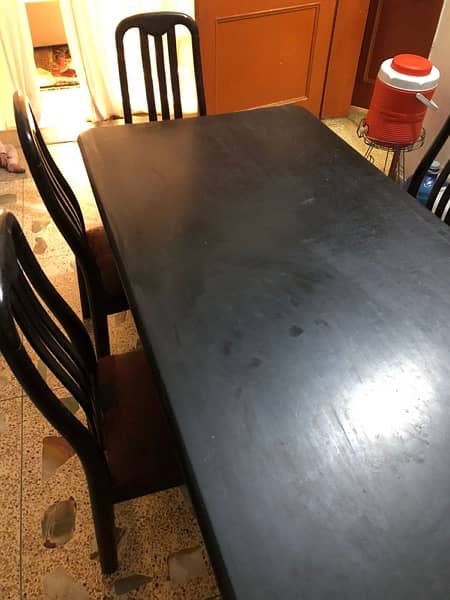 Wooden dining table with 6 chairs. 8