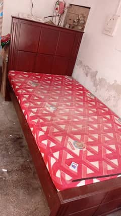 single wooden  bed almost new
