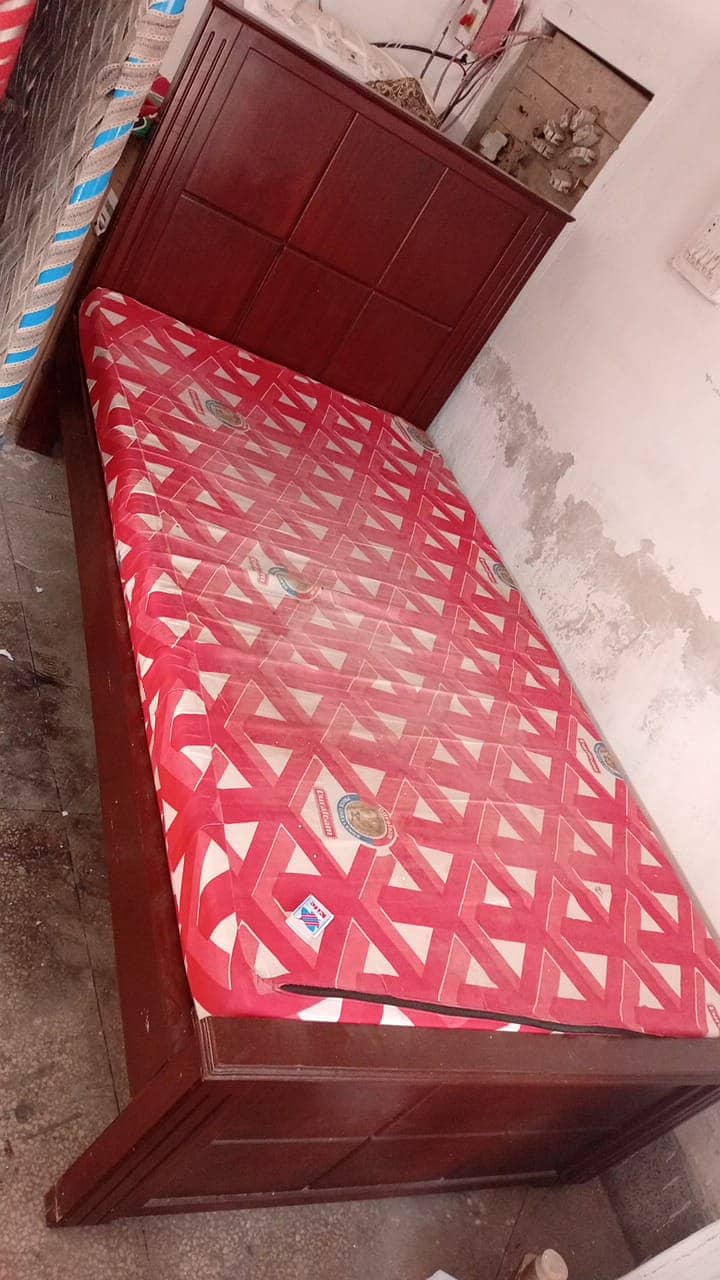 single wooden  bed almost new 2