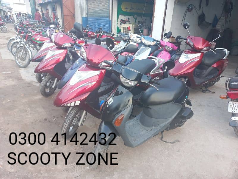 Electric scooty#49cc scooties available contact#0300 4142432# 3