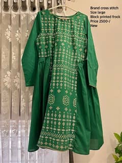 cross stitched green frock