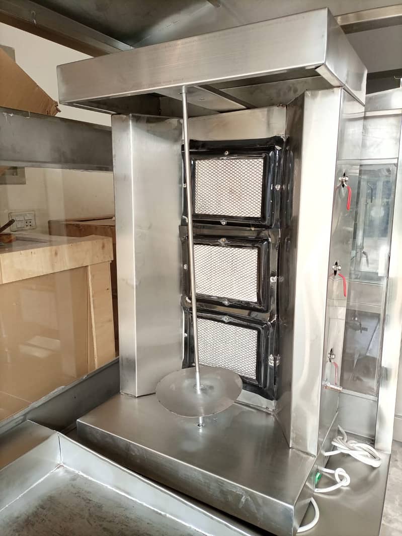 shawarma machine , counters, delivery bags, pizza oven, fryers 0