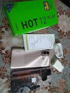 Infinix Hot 12 Play Just Box opened with warranty card
