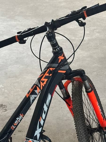 cycle 7 gears xids black and orange volor 4
