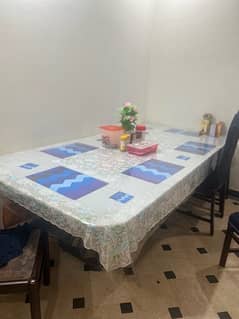 Large sized dining table with 7 chairs