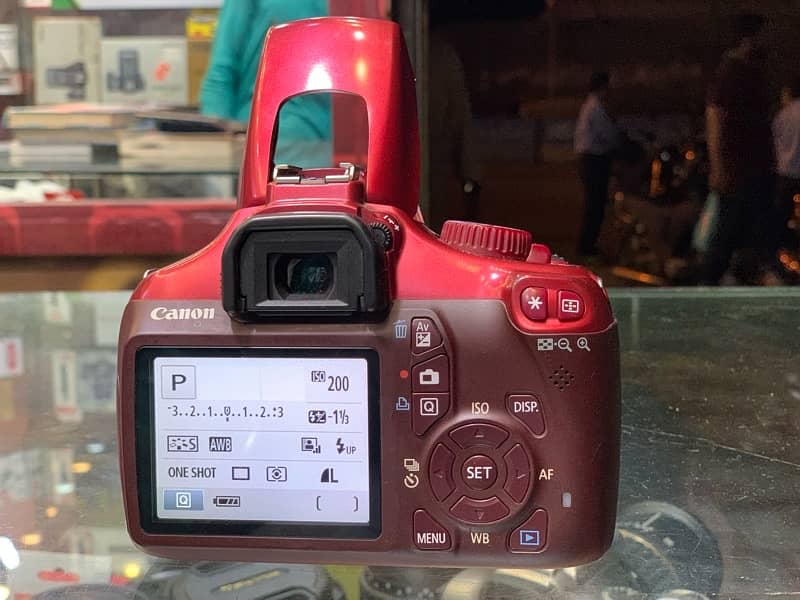 dslr camera canon 1100d kit lens 18/55 one year Shop warranty 1