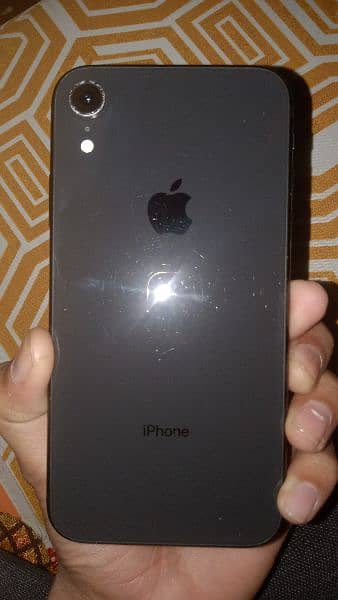I phone XR condition 10/10 water pack bettery original. 1